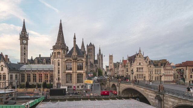Ghent Belgium time lapse 4K, city skyline day to night timelapse at St Michael's Bridge (Sint-Michielsbrug) with Leie River and Korenlei