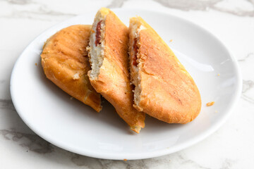 Turkish karisik atom  tost ( kasarli bazlama tost) . Flat baked bread toasted