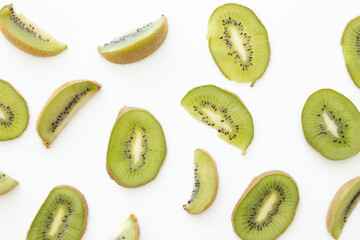 Fresh and ripe sliced kiwi on the white background.