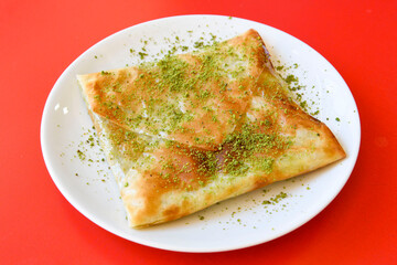 Turkish Dessert Sobiyet  Baklava, mussels baklava and classic baklava with Pistachio . Cevizli, Fistikli Baklava, top view.