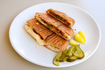 Turkish karisik atom  tost ( kasarli bazlama tost) . Flat baked bread toasted