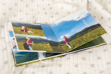 Fototapeta na wymiar Photo Books or Albums Provide Sweet Memory of Growing Up Process to Family Members.