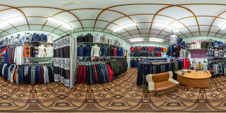 Full seamless spherical panorama 360 angle degrees view in clothing store. The interior of a clothing store, jackets and accessories. Shelves and clothes hangers