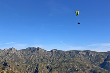 Paraglider in the Mountains of Andalucia in Spain	