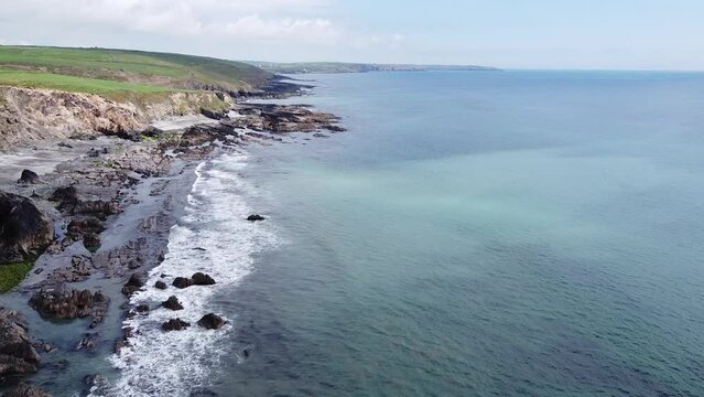 Flying over the beautiful coastline of the Celtic Sea in the south of Ireland near Clonakilty. Rocky seashore in full hd format.