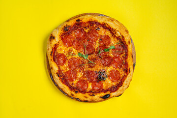 Creative layout of hot delicious pizza in flying on summer orange background. Pizza pepperoni design mockup flyer or poster for promotions and discounts with copy space. Fast Food concept.