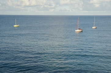 Yachts moored along the coast. Sardina del Norte. Galdar. Gran Canaria. Canary Islands. Spain.