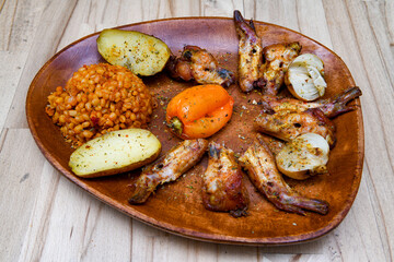 Chicken wings barbeque in a dish with BBQ grill sauce . Izgara tavuk kelebek sis kanat. Tavuk sis, gogus.