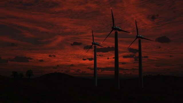 wind-powered electricity generators against a sunset sky