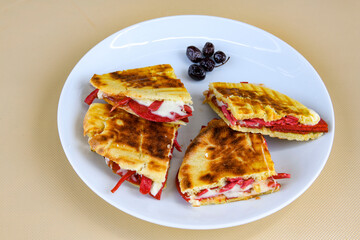 Turkish karisik atom  tost ( kasarli bazlama tost) . Flat baked bread toasted