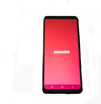 Zomato app splashscreen on a mobile phone