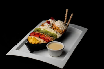 Acai barge on top of white plate