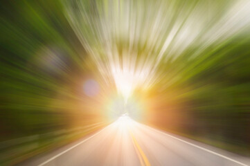 Abstract motion blur speed on the road in forest