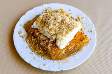 Turkish Dessert Sobiyet  Baklava, kadayif,  mussels baklava and classic baklava with Pistachio . Cevizli, Fistikli Baklava, top view.