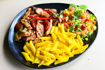 Turkish and Arabic Traditional Ramadan doner kebab with tasty tomato sauce and rice or turkish pilav in white plate on wood table background. ( Pilav ustu doner)