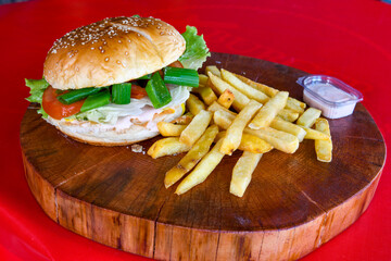 Big tasty  burger with beef cutlet on a plate. Hamburger.