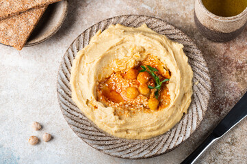 Hummus with crispbread. Healthy snack. Vegetarian food. Chickpea hummus