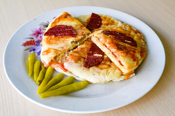 Turkish karisik atom  tost ( kasarli bazlama tost) . Flat baked bread toasted