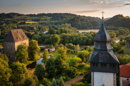 Historical Siedlecin town illuminated by the setting sun in the Bobr Valley Landscape Park, Lower Silesia. Poland