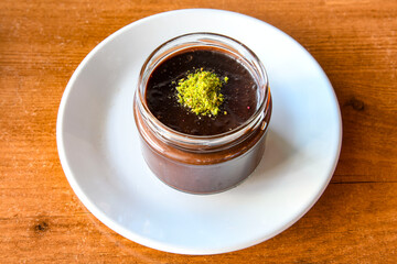 Baked rice pudding turkish milky dessert sutlac, keskul  (Turkish name; firin sutlac)