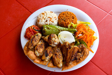 Chicken wings barbeque in a dish with BBQ grill sauce . Izgara tavuk kelebek sis kanat. Tavuk sis, gogus.