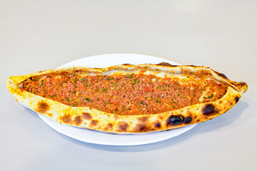 Turkish pita with minced cubed meat and cheese (Turkish name: Kiyma Kusbasi kasarli pide)