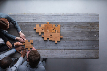 Fototapeta premium Business people team with puzzle