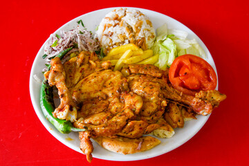 Chicken wings barbeque in a dish with BBQ grill sauce . Izgara tavuk kelebek sis kanat. Tavuk sis, gogus.