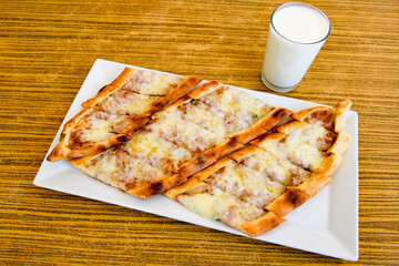 Turkish pita with minced cubed meat and cheese (Turkish name: Kiyma Kusbasi kasarli pide)
