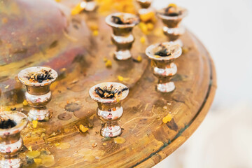 Candle stand in the church. Lighting the Fire and prayer in the temple.
