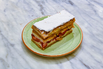 Table scene of assorted take out or delivery foods. Traditional Turkish cuisine. Various Turkish desert and cake. Top down view on a table.