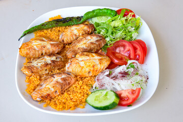 Chicken wings barbeque in a dish with BBQ grill sauce . Izgara tavuk kelebek sis kanat. Tavuk sis, gogus.