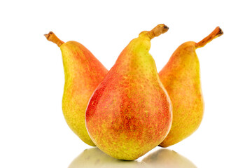 Three organic juicy pears, close-up, isolated on a white background.