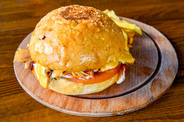 Big tasty  burger with beef cutlet on a plate. Hamburger.