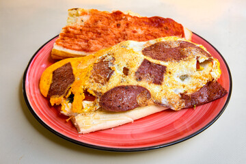 Turkish karisik atom  tost ( kasarli bazlama tost) . Flat baked bread toasted