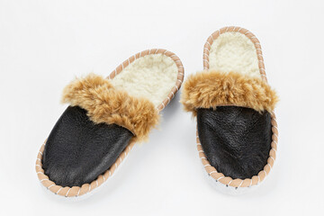 Warm slippers on a white background.