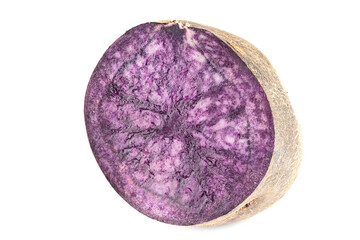Vitelotte potatoes. Raw unpeeled purple potatoes isolated on white background