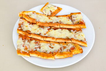 Turkish pita with minced cubed meat and cheese (Turkish name: Kiyma Kusbasi kasarli pide)