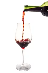 Fotobehang glass of red wine with splash © JLabrador