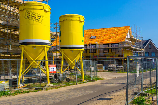 construction site with beamix cement towers and houses under construction, Rucphen, The Netherlands, 6 may, 2022