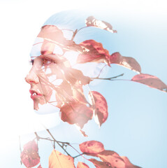 Double exposure of young woman combined with photograph of leaves.