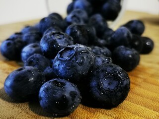 Fresh Blueberry fruits. Drops of water on organic blueberry