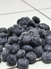 Fresh Blueberry fruits. Drops of water on organic blueberry