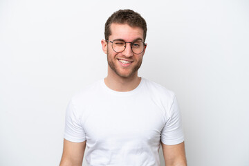 Young caucasian man isolated on white background With glasses and happy expression