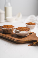 muffin cupcake paper mold carrot cake topped with whipped cream and berries