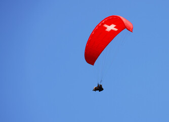 Paraglideing in Interlaken, Switzerland. Interlaken is famous resort in paragliding flights.