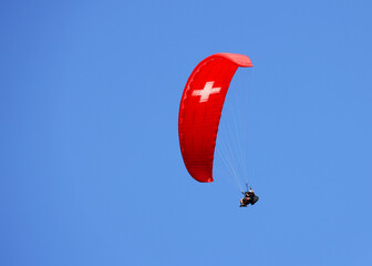 Paragliding in Interlaken, Switzerland, Europe. Interlaken is famous resort in paragliding flights