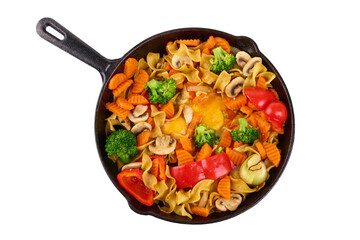 Pasta with steamed vegetables in a pan, organic food, isolated on white background.