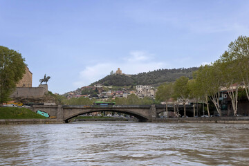 The Kura River (Mtkvari), Metekhi Bridge, and Statue of King Vakhtang Gorgasali, Tbilisi, Georgia © Walter_D