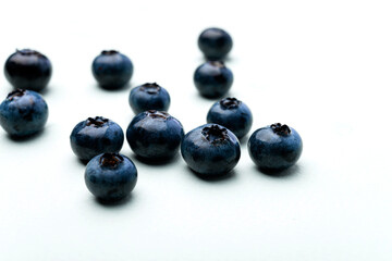 Ripe sweet blueberries. Blueberry white background with space for text. blueberry texture close up